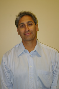 Dr. Raman Tuli